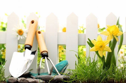 Satisfied customer enjoying a cleared garden in East Ham
